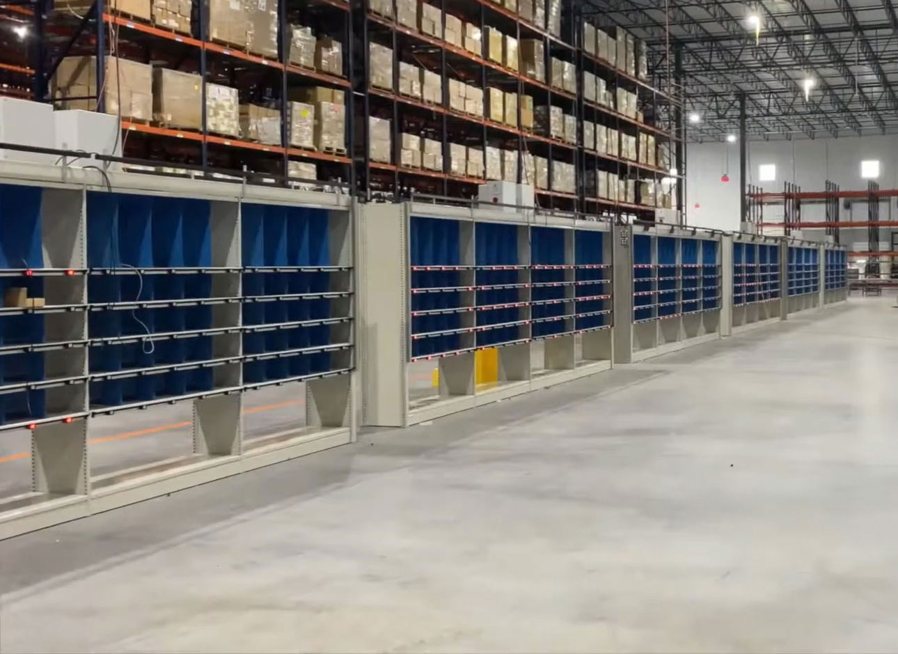 WPSS Gallery Put wall pick shelving with pick lights installed long view