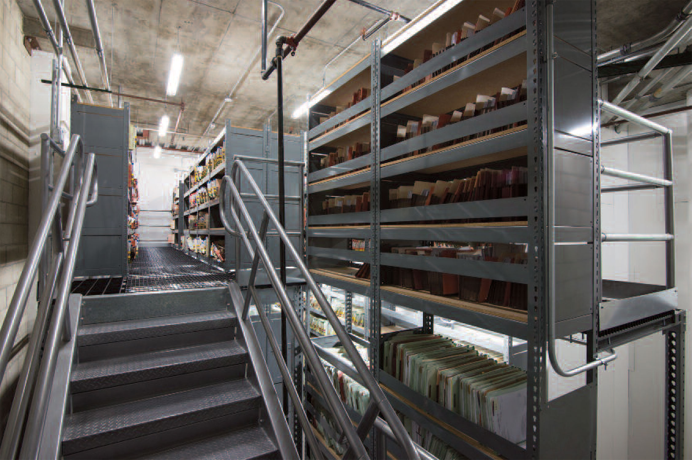 WPSS gallery rivetier with closed panels on catwalk - archives and record storage stairway view